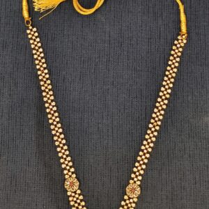 Traditional Gold Necklace with Floral Motifs and Green Pendant